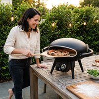 Propane Pizza Oven Designed for Backyard Entertaining, 12-Inch Stone, Rotatable Motor, Gas Fired — Lifestyle